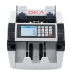 ⁦ماكينة عدّ وفرز العملات OKA
لعدّ وفرز العملات المختلفة وكشف التزوير
(الدولار – اليورو – اليوان الصيني – الليرة التركية)
مع إمكانية إضافة أي عملة أخرى حسب احتياجك
موديل OKA-MIX105⁩ - الصورة ⁦2⁩