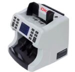 اوكا ماكينة فرز وعد النقود وكشف التزوير بالاضافة الي برنتر داخلية لطباعة تقرير النقود ( مصري – دولار – يورو ) / موديل OKA-880P